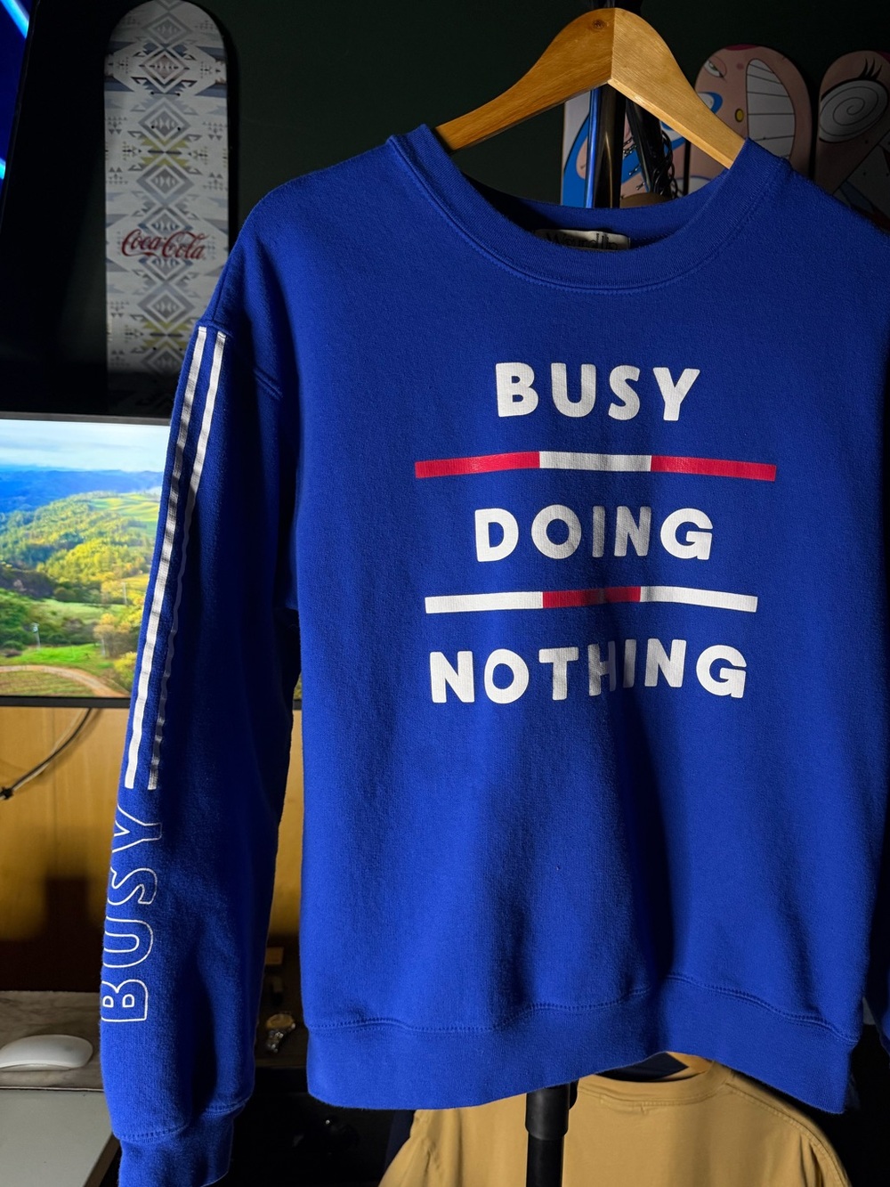 Busy Doing Nothing Blue Graphic Crewneck Sweatshirt- Blue Red White
